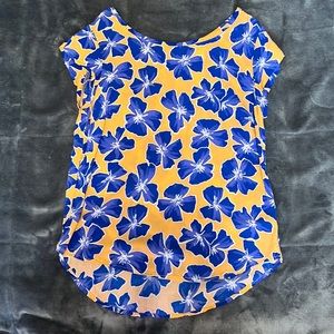 Light orange top with blue flowers